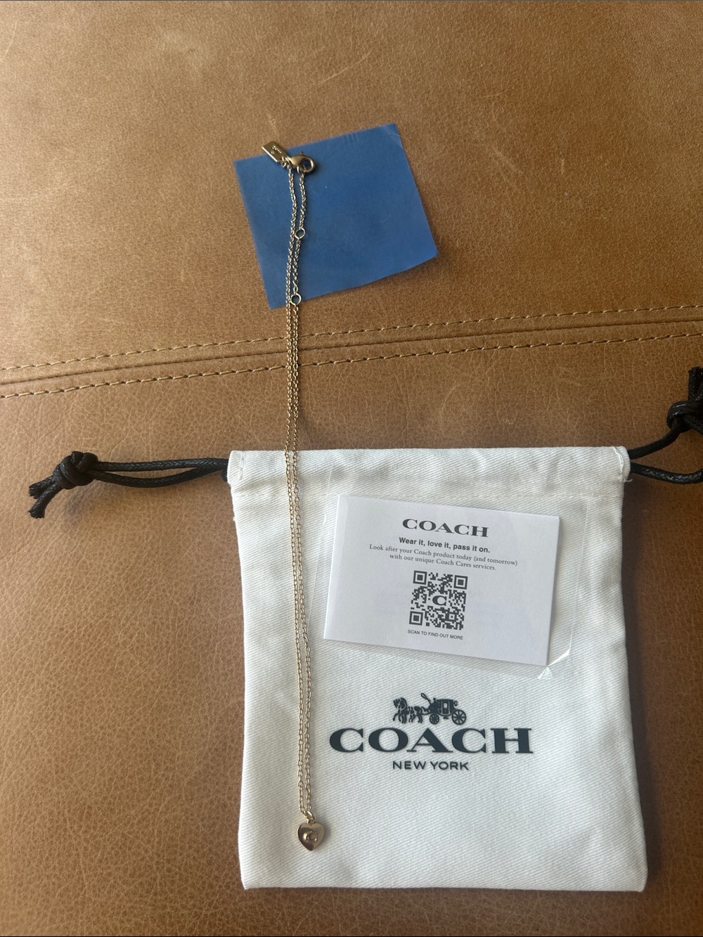 Coach Gold-tone Heart Pendant Necklace with White Drawstring Pouch